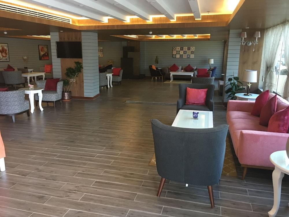 布贾里-达哈兰金色酒店 阿可贺巴 外观 照片